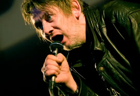 The Pogues frontman dies at 65