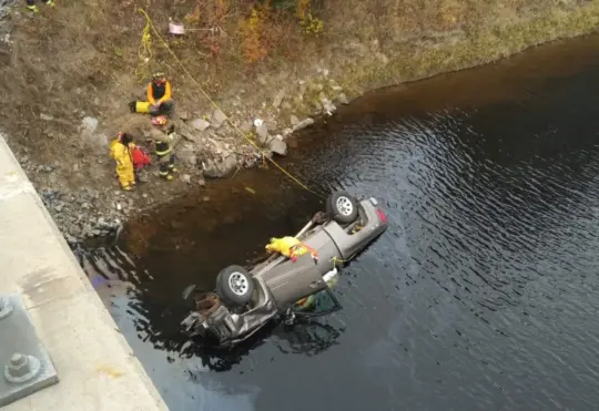One charged after vehicle plunges into Aguasabon River