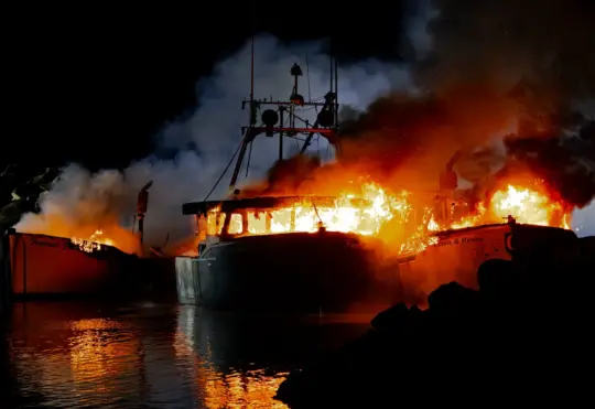 Fire destroys 3 lobster boats on Pembroke wharf