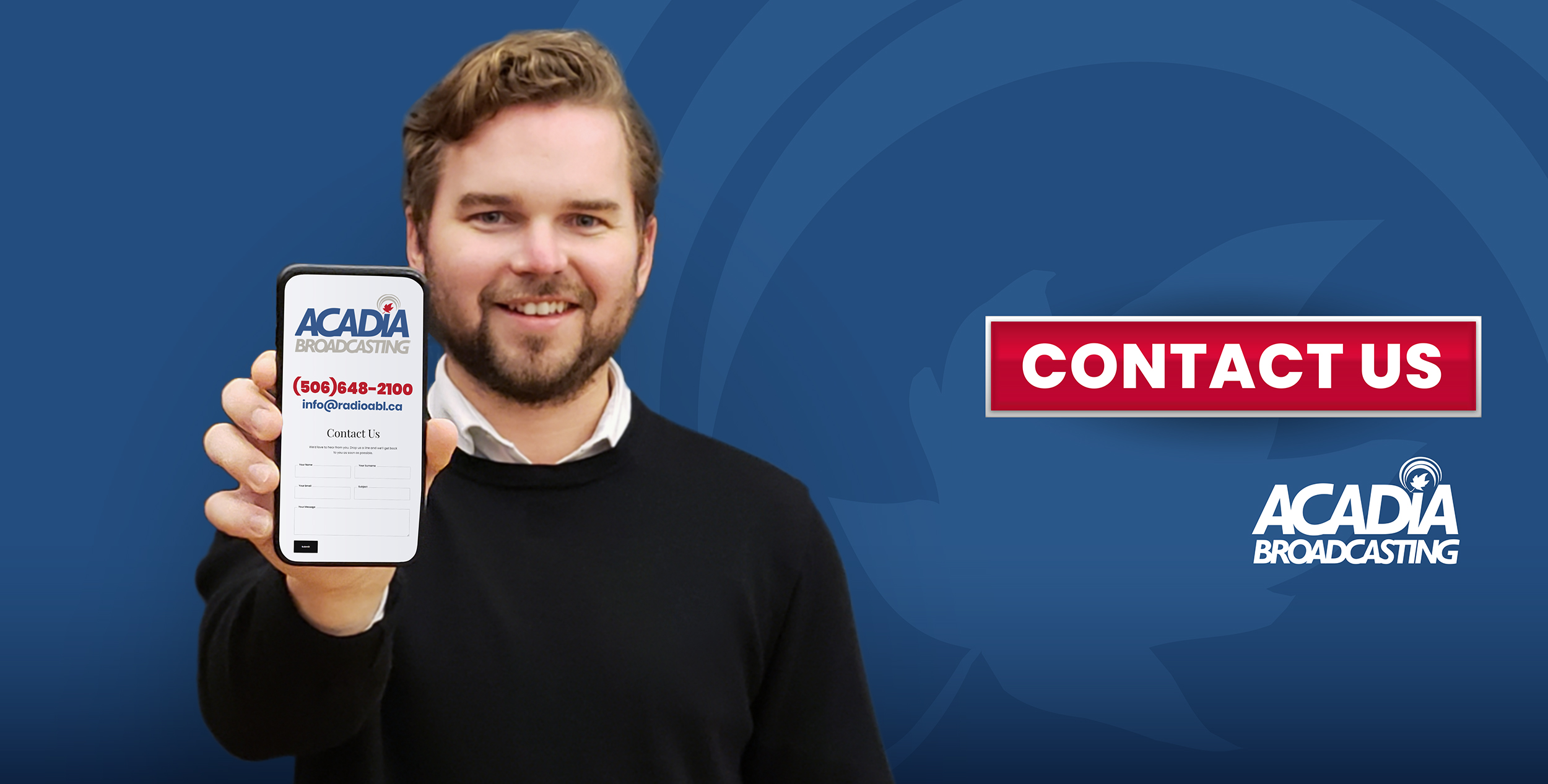 Image of man holding phone