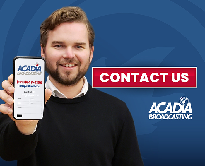 Image of man holding phone