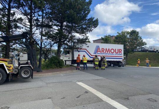 Delivery truck hits utility pole, fence in Saint John