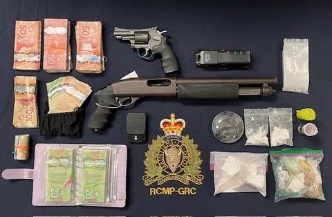 Drugs and weapons seized in trafficking investigation