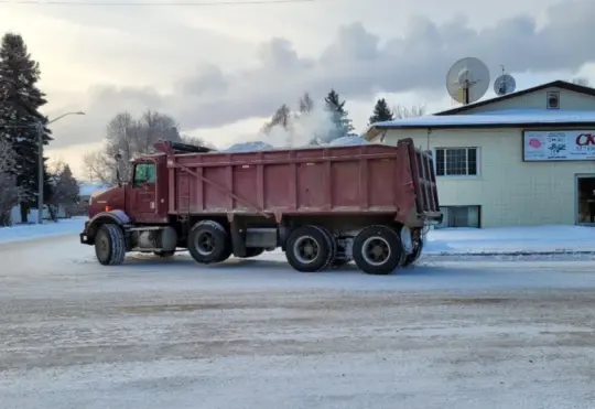 Downtown snowbank removal underway