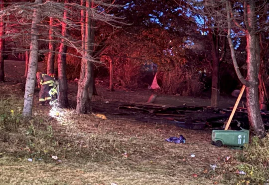 Fire destroys structure at homeless encampment