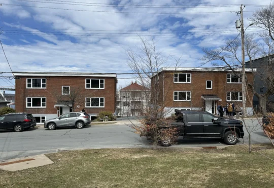 Non-profits open low-cost apartments for youth, young adults