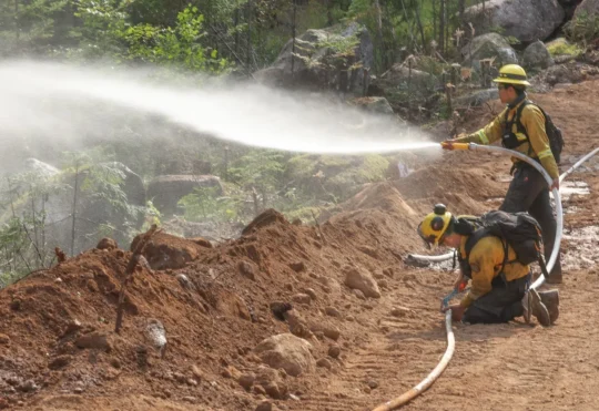 Long Lake fire sounded like ‘freight train’, now less extreme but remains very challenging
