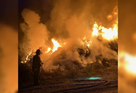 Fire at Prince of Wales gravel pit spreads into woods