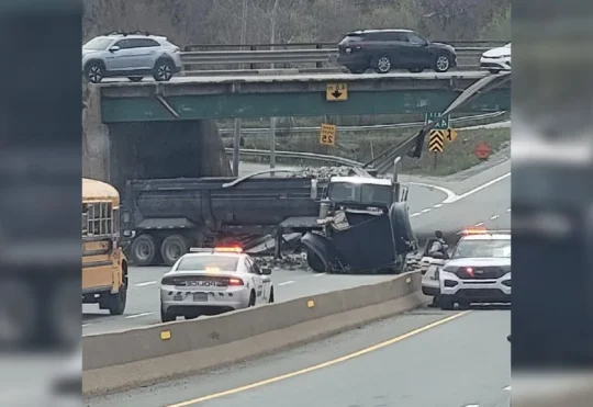 Transport truck drives off overpass, hits school bus in Lower Sackville