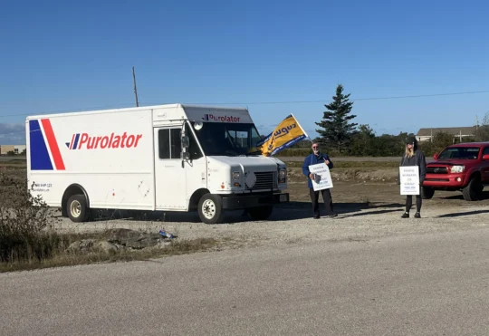 Striking CUPW members picket at Purolator in Yarmouth