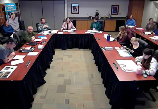School board trustee resigns