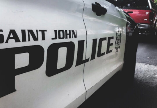 Man arrested after report of person armed with rifle