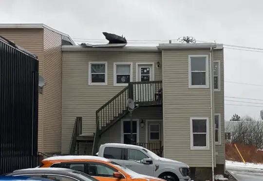 VIDEO: High winds damage roof in Saint John