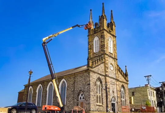 Stone Church tower nears completion, $2M needed to fix rest of building